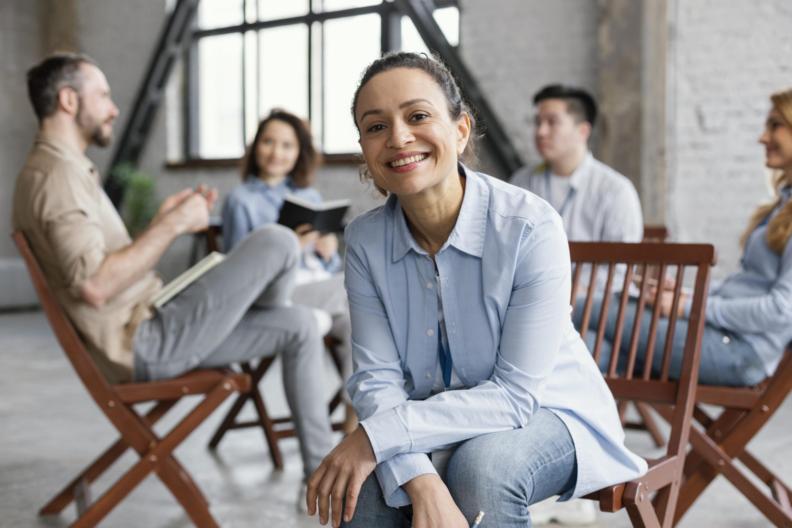 close-up-people-sitting-chairs